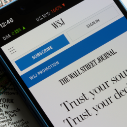 Wall Street Journal displayed on a cell phone.