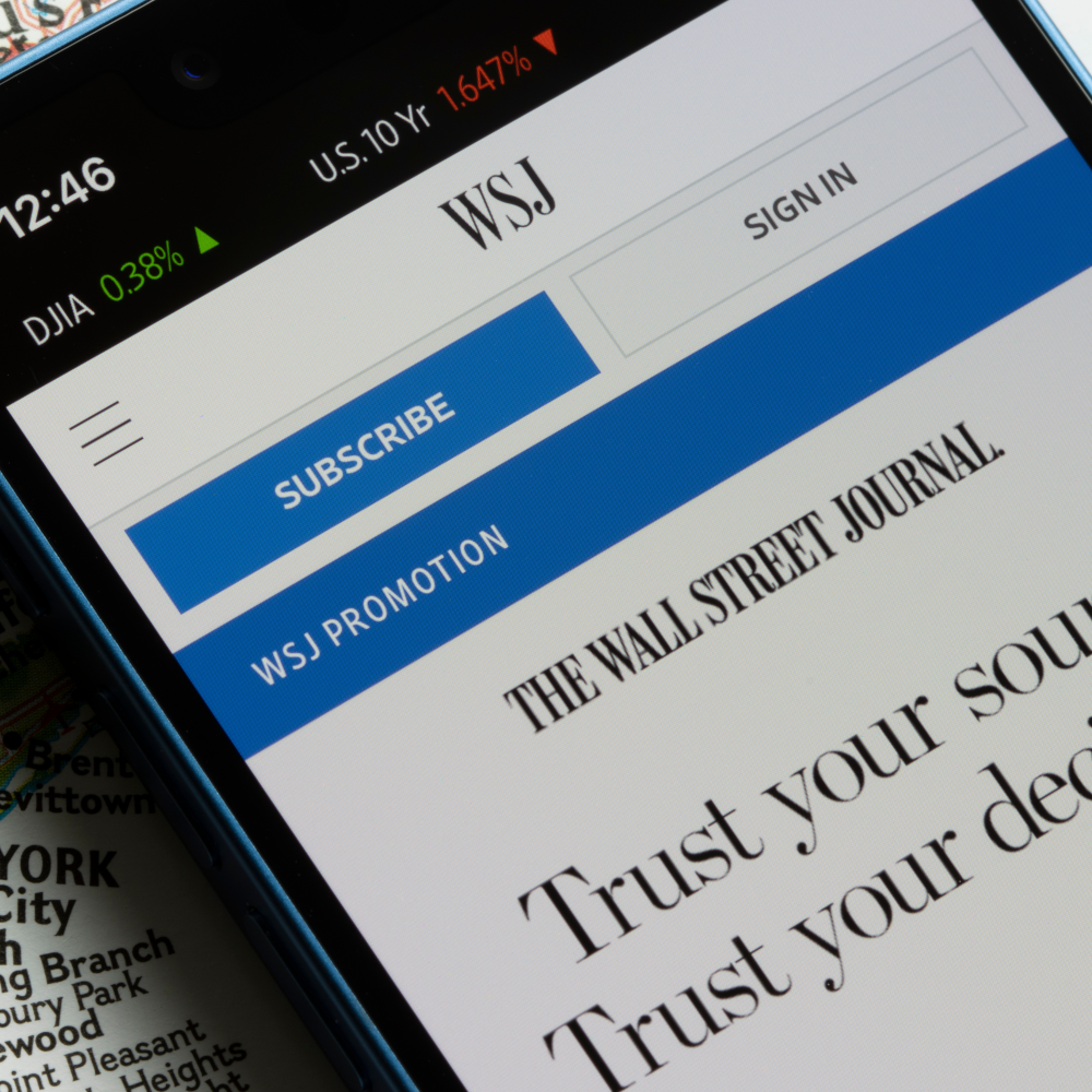 Wall Street Journal displayed on a cell phone.