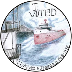 Circular sticker featuring the text "I VOTED" above an illustration of the cargo ship Edmund Fitzgerald.