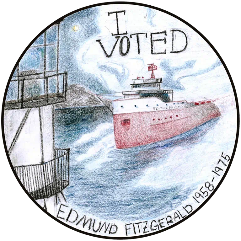 Circular sticker featuring the text "I VOTED" above an illustration of the cargo ship Edmund Fitzgerald.