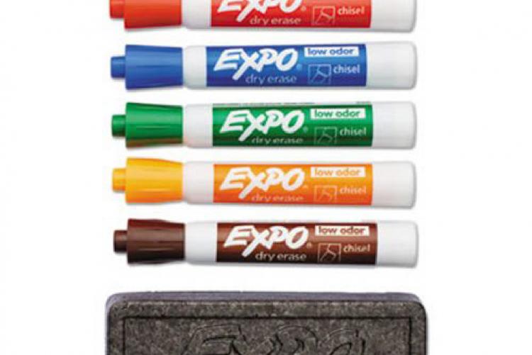 A photo of dry erase markers and an eraser