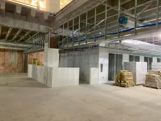 Future printing area and librarian offices on the second floor, with an open ceiling space for the grand staircase.