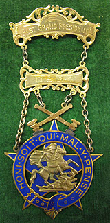 A sons of St. George Badge